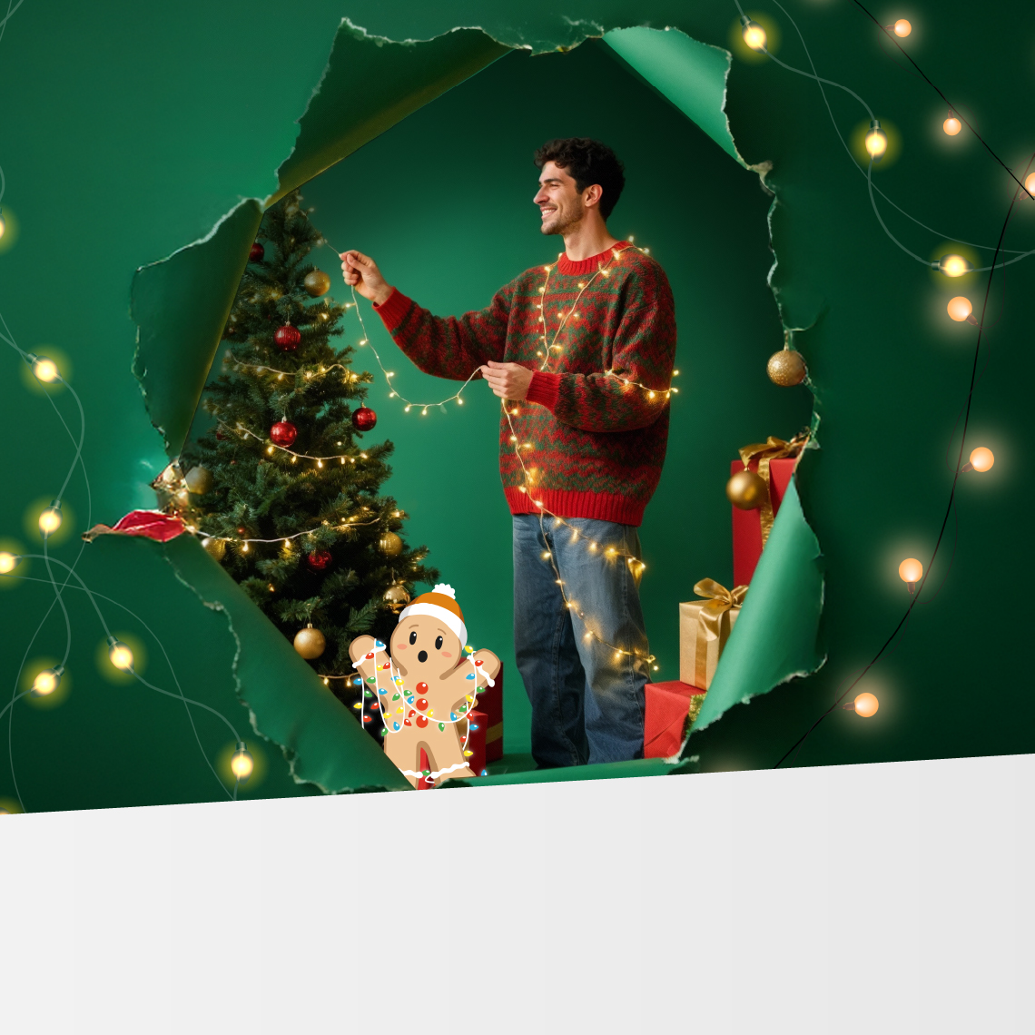 a man decorating the Christmas tree