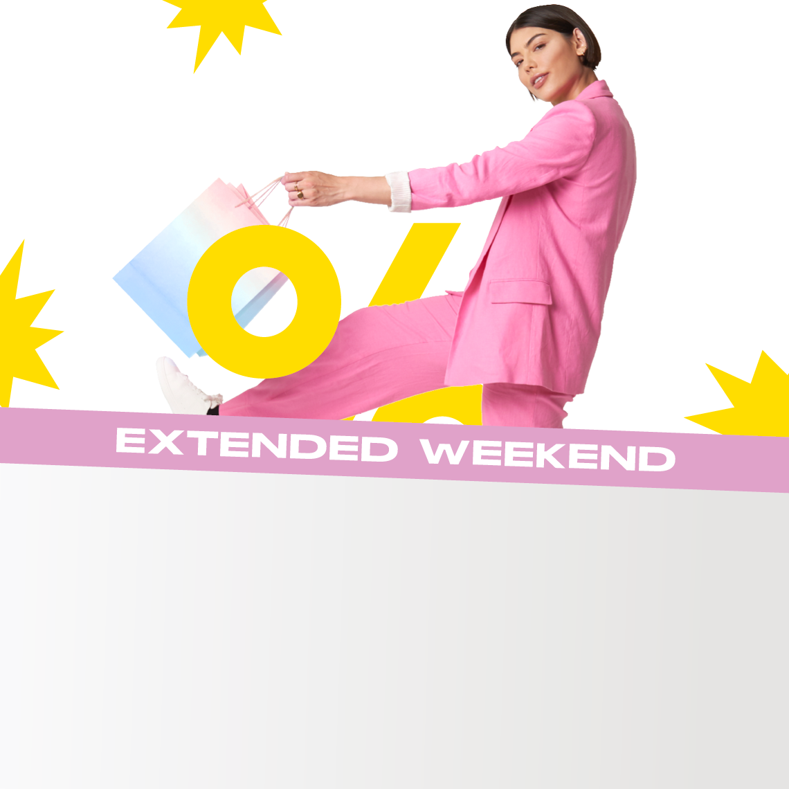 woman dressed in pink with a shopping bag